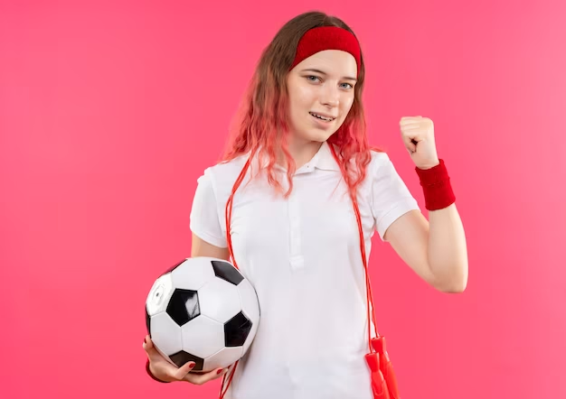 Young Sporty Girl in Football Kit