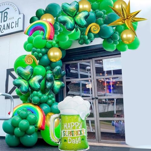 St. Patrick's Day balloon arch with green and gold balloons in front of an office