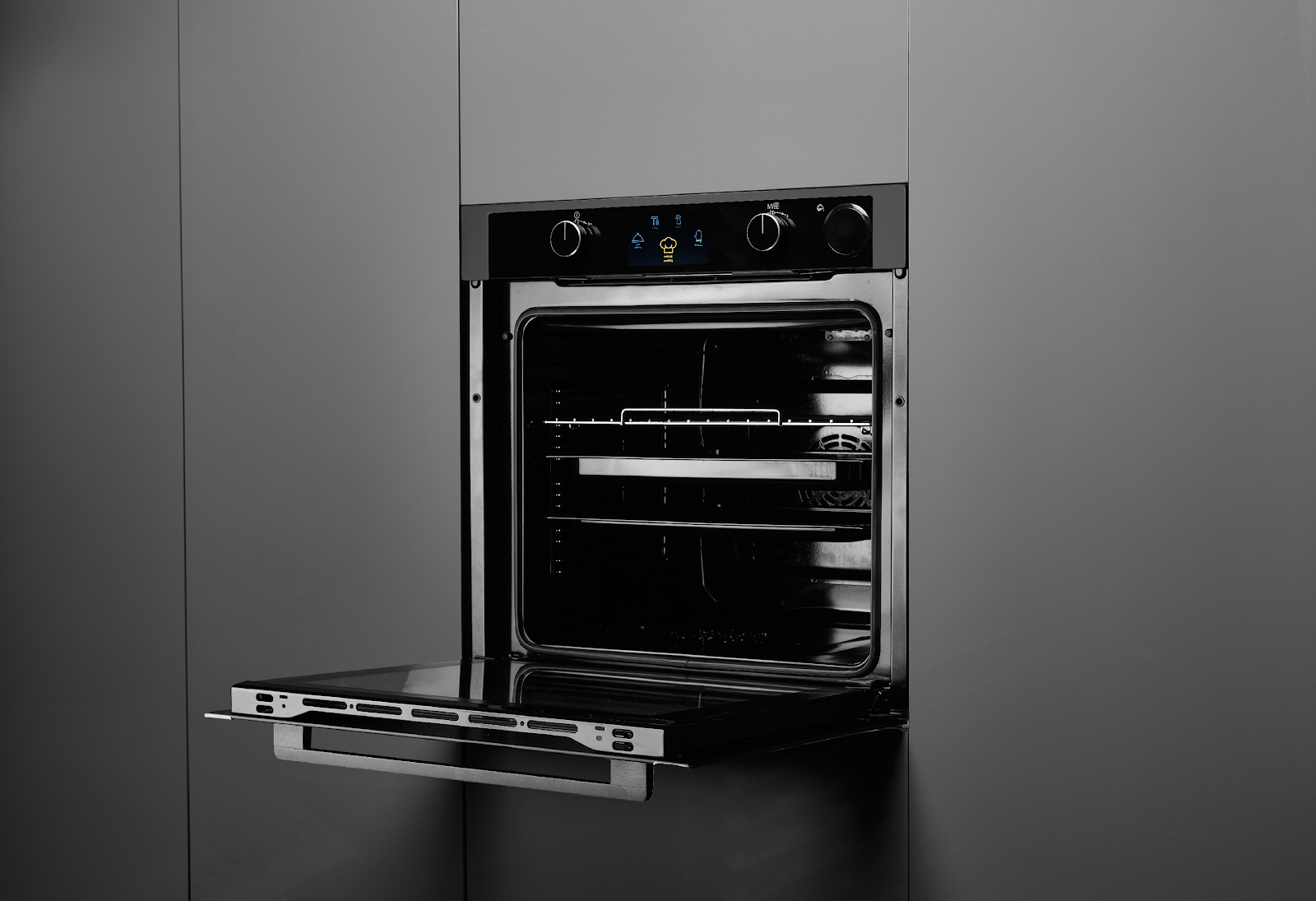 An open oven with a door open

Description automatically generated