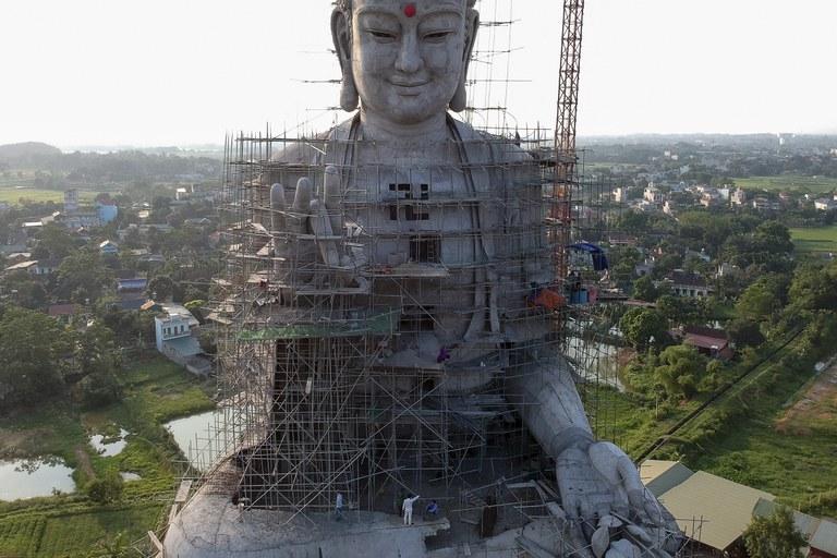 A large statue under construction

Description automatically generated