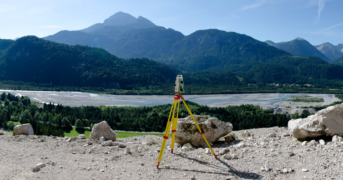 A land surveying tool called a theodolite being used to create a parcel map. 