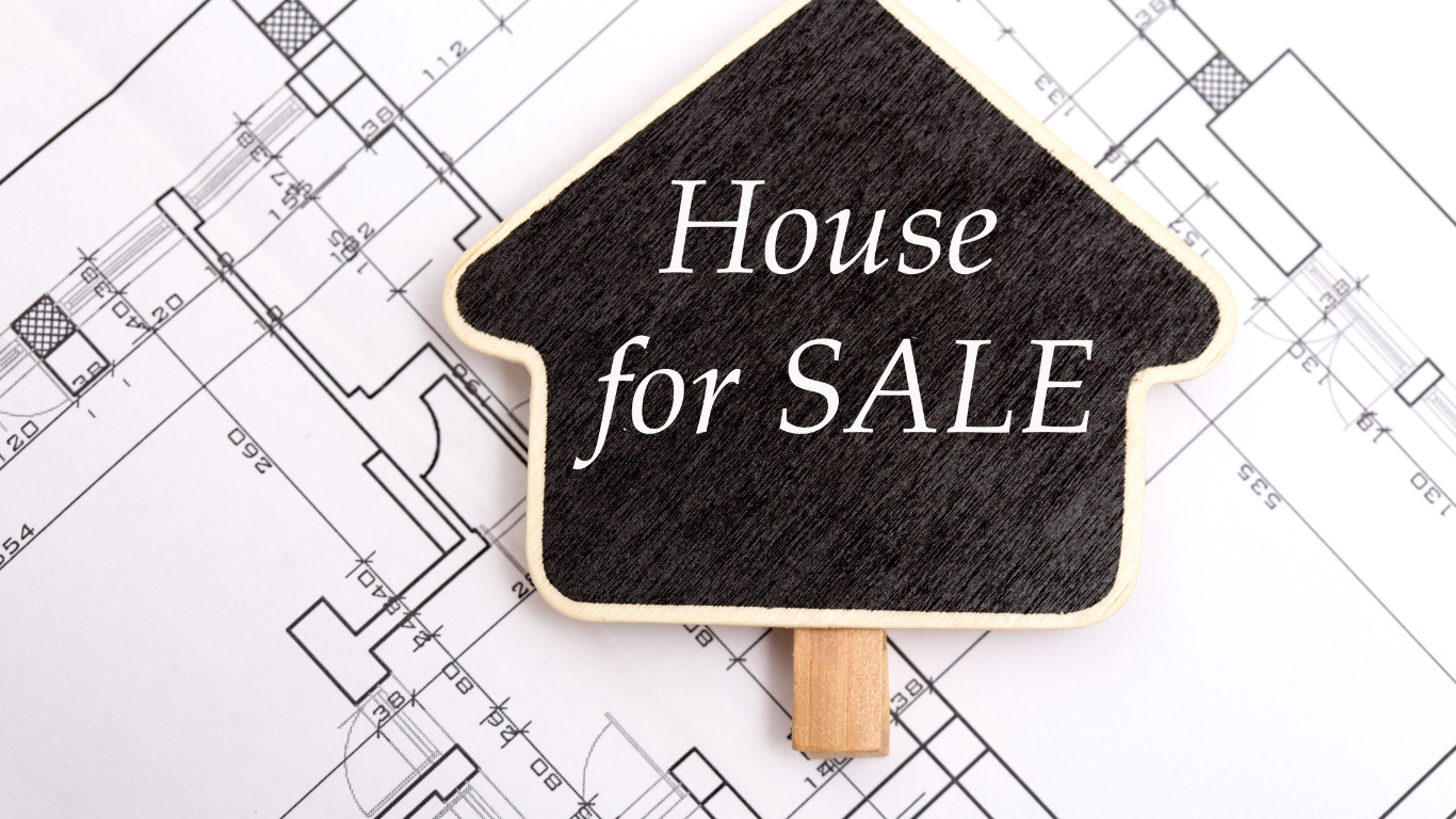 black house for sale sign on top of house layout