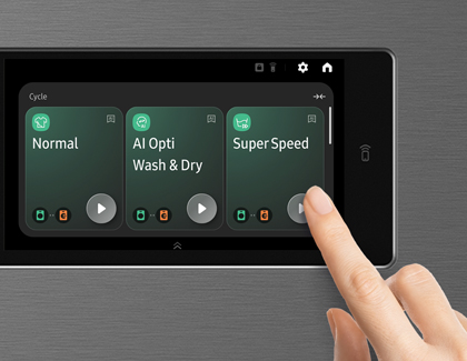 A finger tapping SuperSpeed on the control panel of a Samsung all-in-one laundry combo unit.