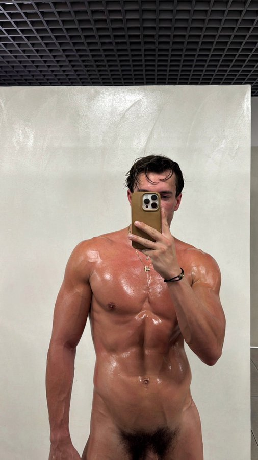 Eric Rmgr sweaty and wet taking a naked iphone mirror selfie showing off his hot pubic area