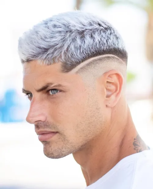 Picture of a  guy rocking the platinum look  on his edgar haircut