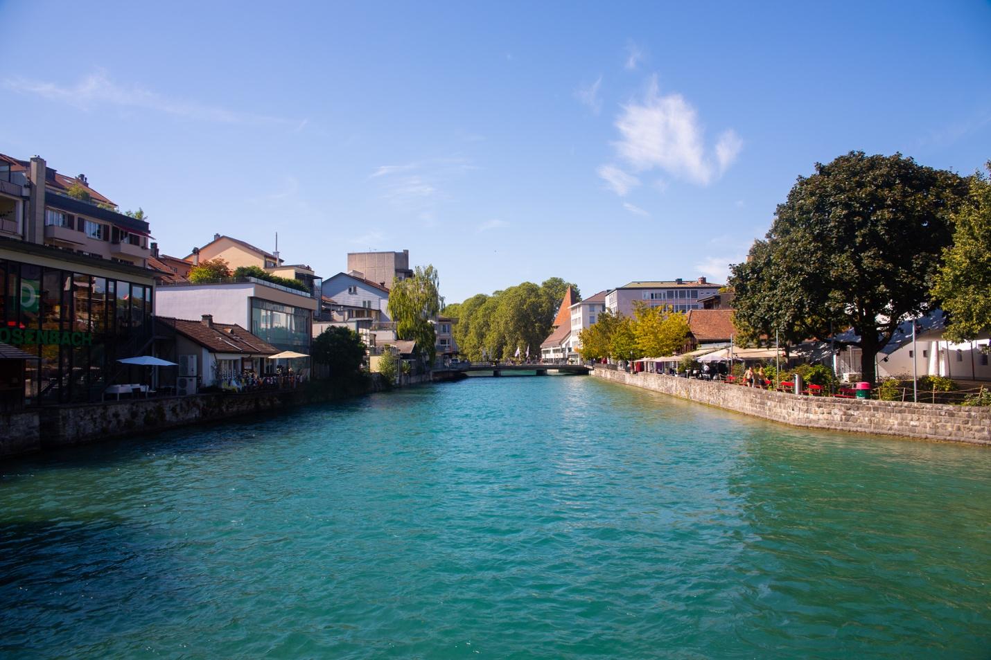 A river with houses and trees

Description automatically generated