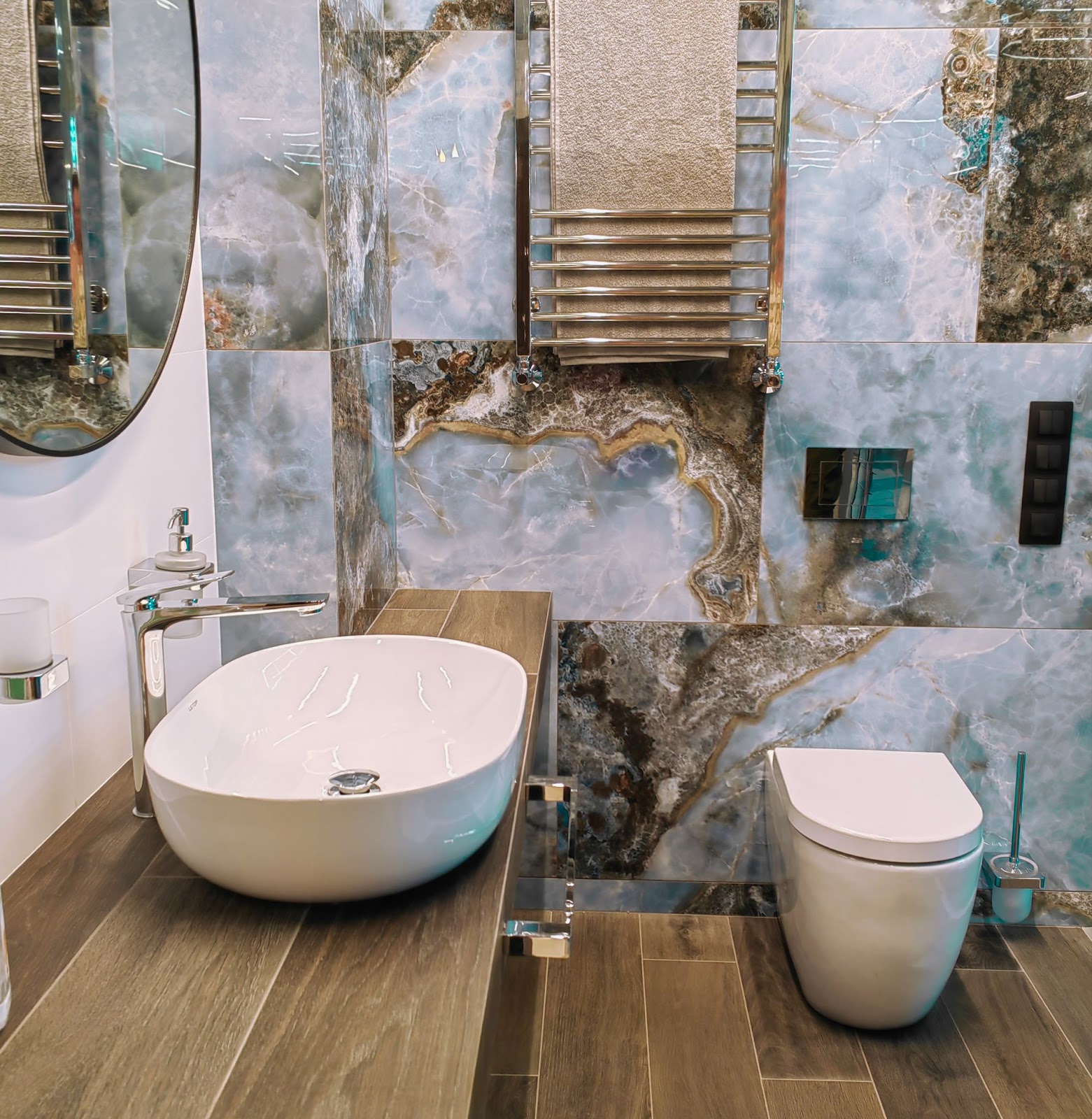  A modern, beautiful bathroom includes a smart toilet and sink.