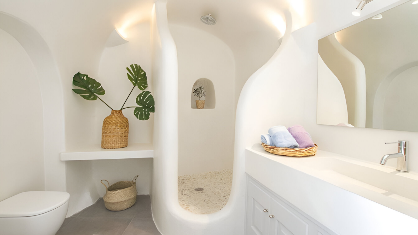The bathroom of a unique vacation rental in Santorini