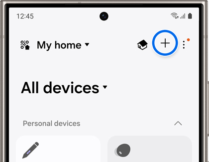 A Galaxy phone with the SmartThings app open and a blue circle around the plus icon.