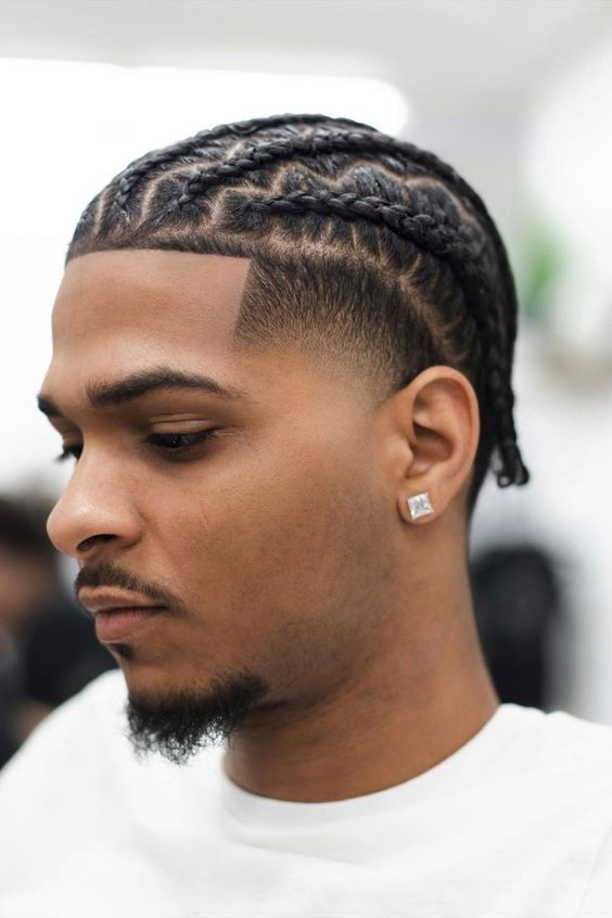 Braids For Men: Picture of a guy rocking stylish braids for men
