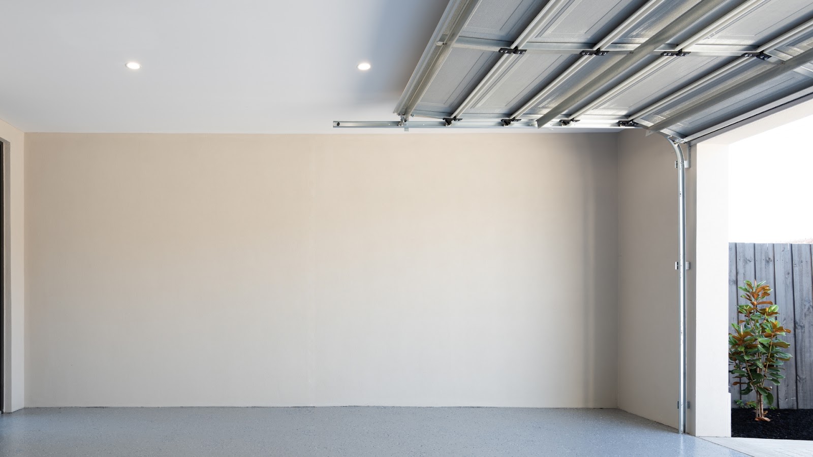 A panel lift garage door in an open position