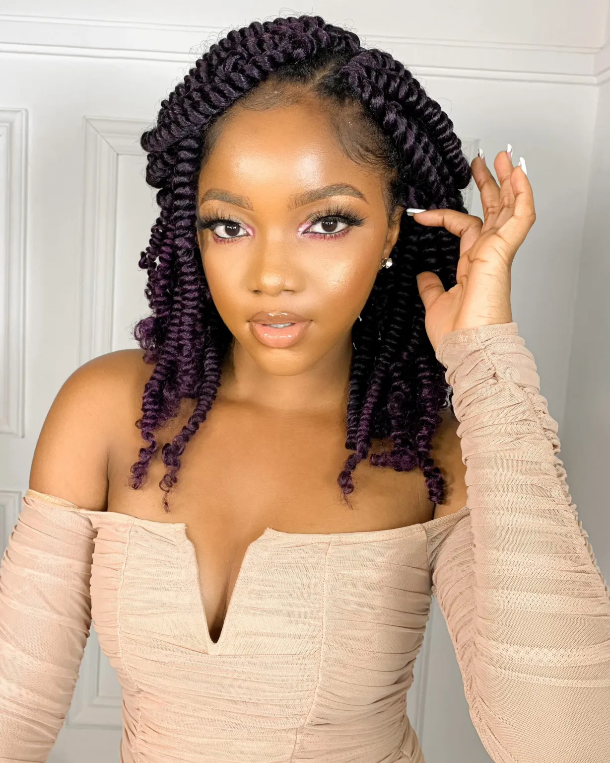 Crochet hair: Full view  showing a lady rocking the twist hairstyle 