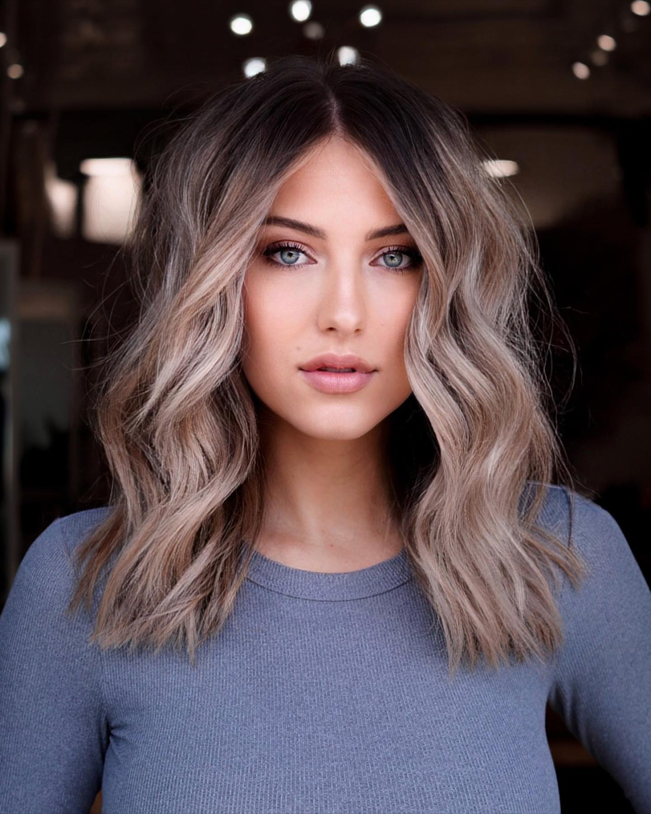 Center-Parted Ash Brown Hair Shoulder Length Hairstyles