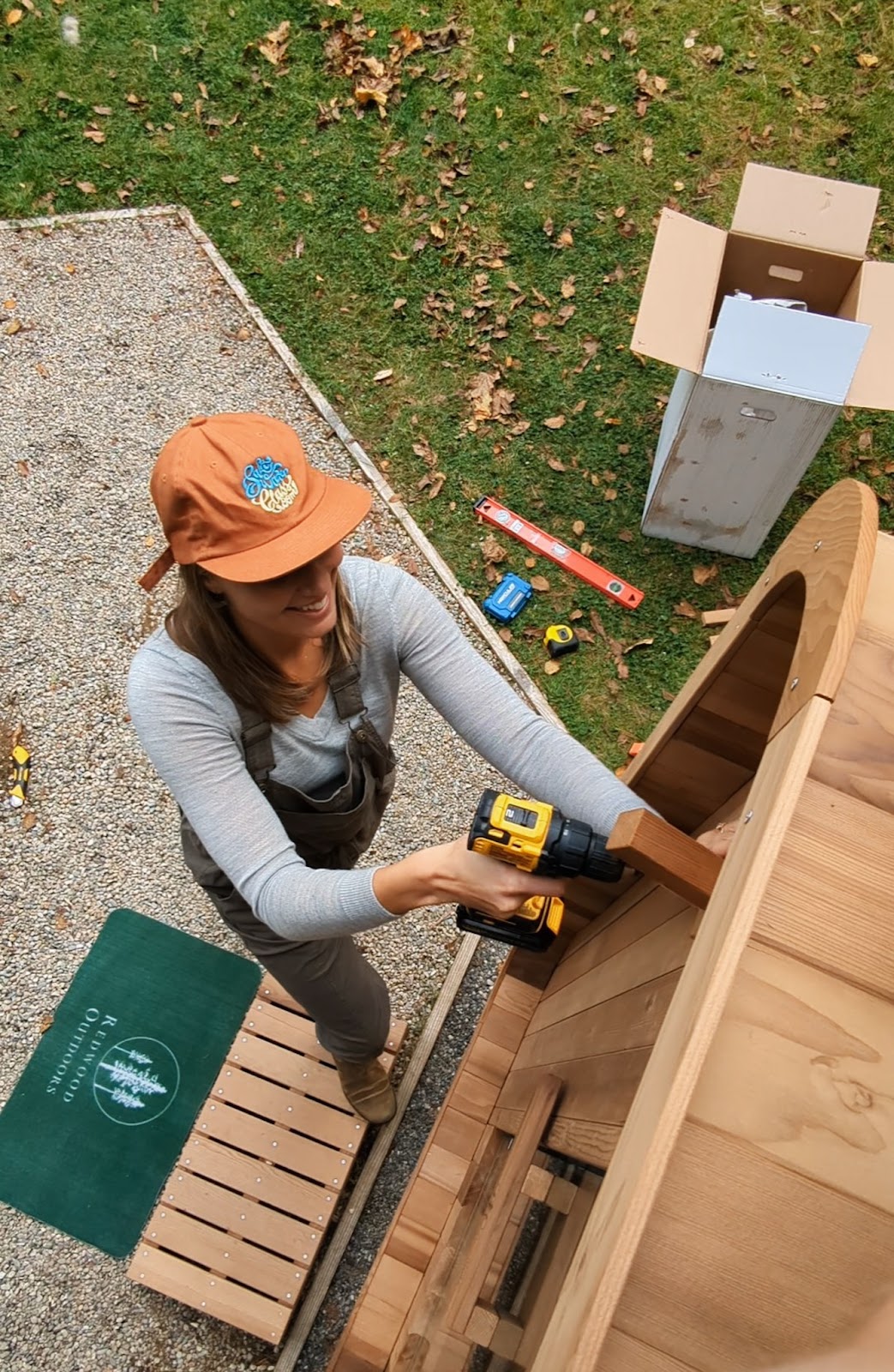 One of our clients works on assembling the Thermowood Mini-Cube Sauna