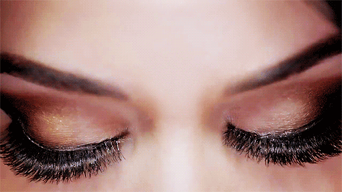 A close up of a person's eyes

Description automatically generated