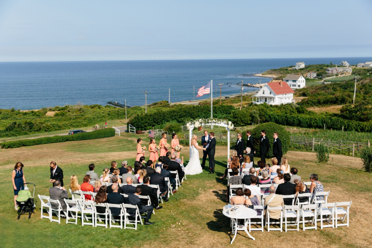 Beachfront wedding ceremony taking place at the Spring House Hotel on Block Island, RI