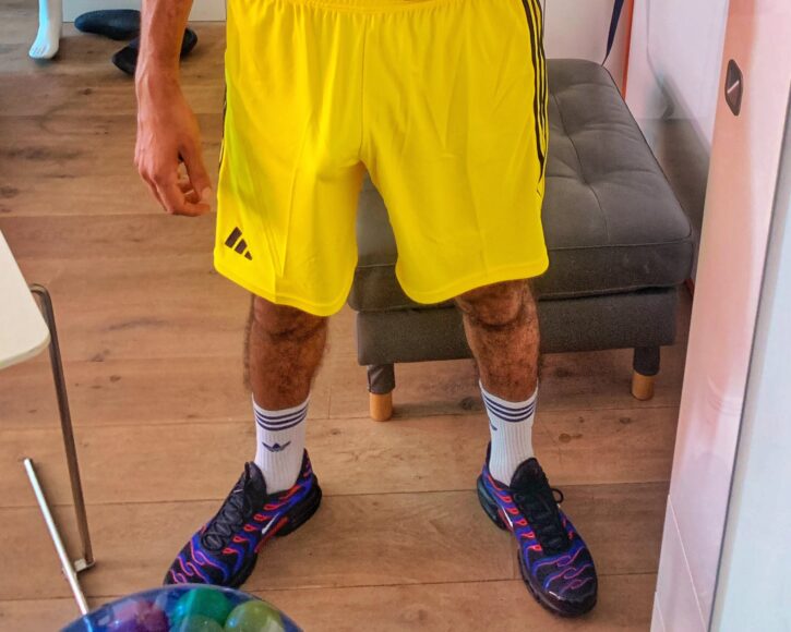 karim yoav freeballing in yellow shorts while taking a mirror selfie