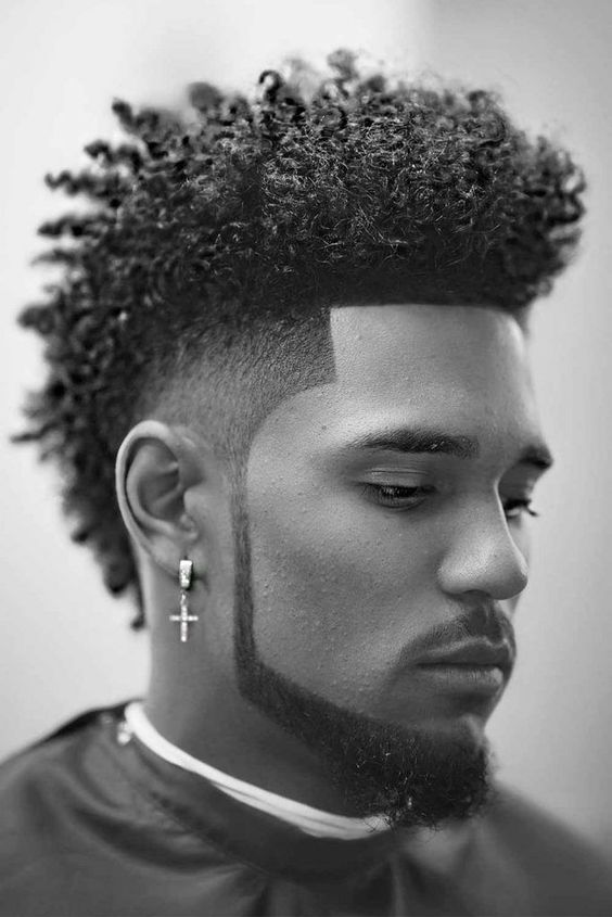 Hairstyles for Men: Black and white picture of a guy with mohawk