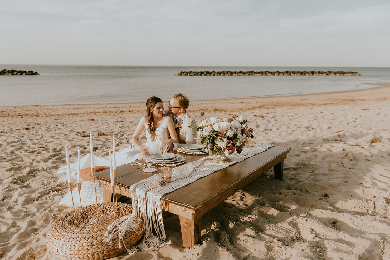 Bride and groom enjoy a luxury picnic by Moonfly Events after eloping in Virginia Beach Virginia