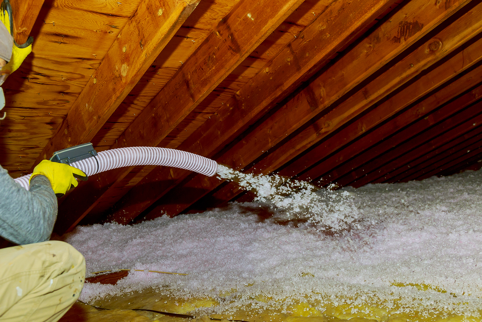 Blown-in attic insulation being installed in Wisconsin