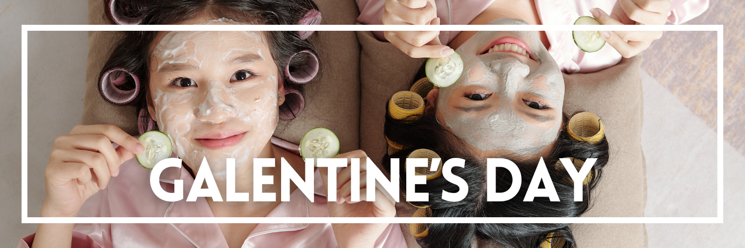 An image showcasing two girls with masks on their faces and wearing hair rollers shows that a pampering day with friends is a great way to celebrate Galentine’s Day!