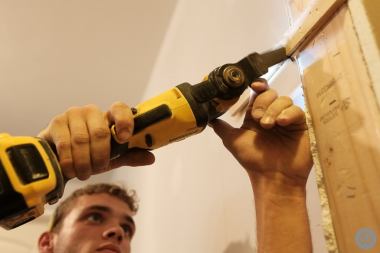 reasons why hiring a licensed remodeler is important basement remodeling carpenter with power tool custom built michigan