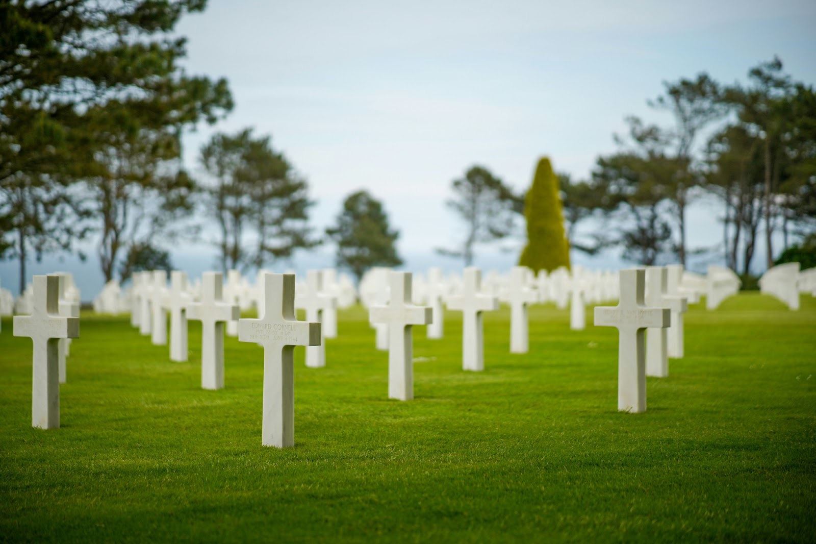 Rows of white crosses at the American Cemetery, a solemn tribute to D-Day heroes.