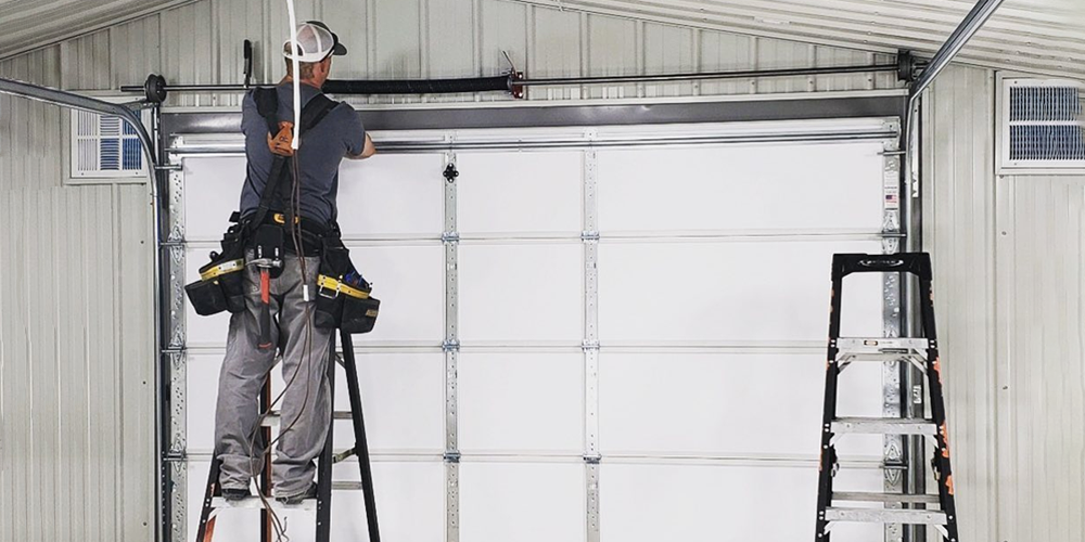Why Hire A Professional For Garage Door Repairs? - Raynor