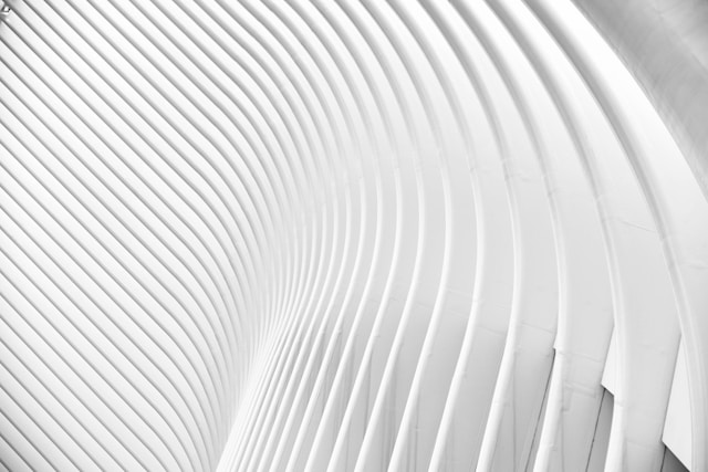 A white building facade with louvres designed using parametric design principles