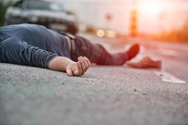 Traffic accident.Young man hit by a car Traffic accident.Young man hit by a car man dead stock pictures, royalty-free photos & images