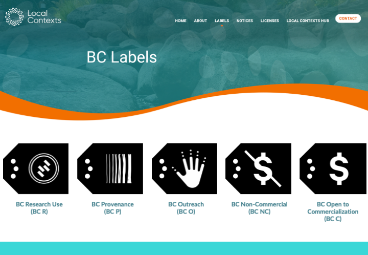Screenshot of the “BC Labels” page on the Local Contexts website with six BC Label icons and titles in a row: BC Research Use Label icon, a black label icon with two concentric circles with four rectangles within. On the left side of the Label are three dots. BC Provenance Label icon, a black label icon with seven white vertical, hand-drawn lines that get bigger from left to right. On the left side of the Label are three dots. BC Outreach Label icon, a black label icon with a white hand illustration with two dots above each finger. On the left side of the Label are three dots. BC Non-Commercial icon, a black label icon with a crossed out dollar sign in white. On the left side of the Label are three dots. BC Non-Commercial icon, a black label icon with a dollar sign in white. On the left side of the Label are three dots.