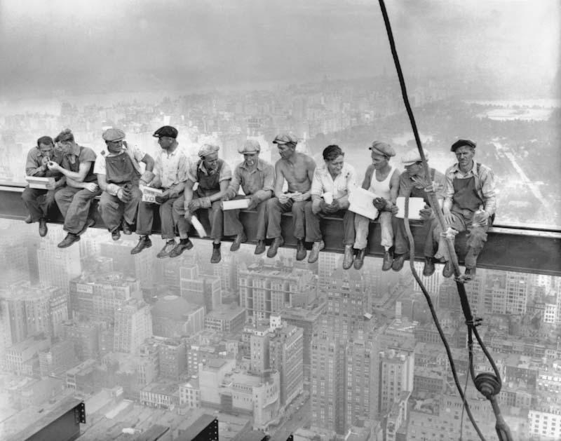 The famous 'Lunch atop a Skyscraper' image from the 1930s shows workers sitting on a beam precariously hanging above the city.