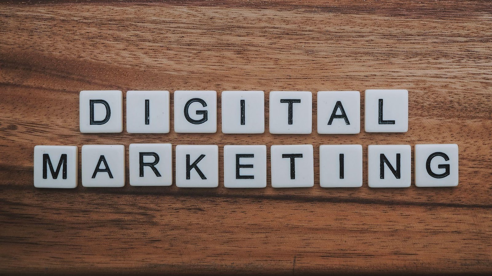 the words digital marketing spelled with tile pieces