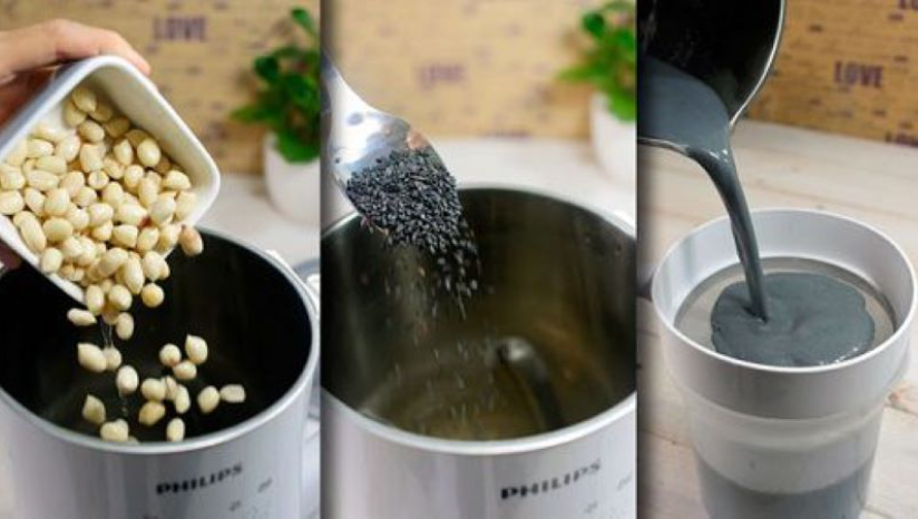 Đổ mè đen cùng đậu nành vào cối xay của máy làm sữa hạt rồi chọn chế độ nấu sữa 