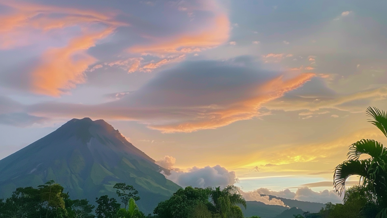 The Arenal Volcano underneath gradient skies in Costa Rica