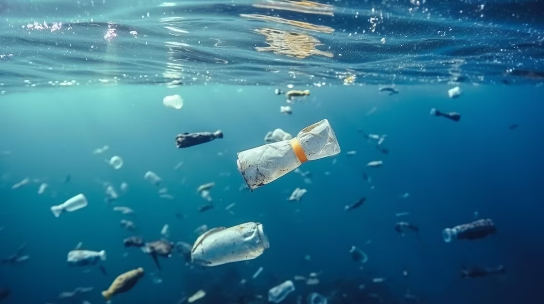 How Plastic Pollution Harms Marine Life - plastic bottles floating in the ocean