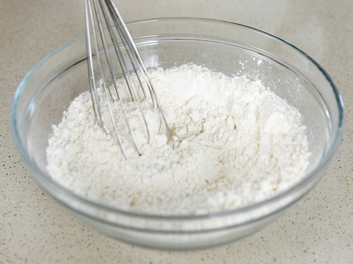 Whisking dry ingredients.