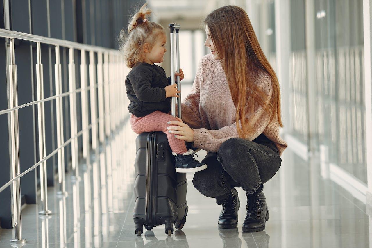 A mother and her daughter at the airport