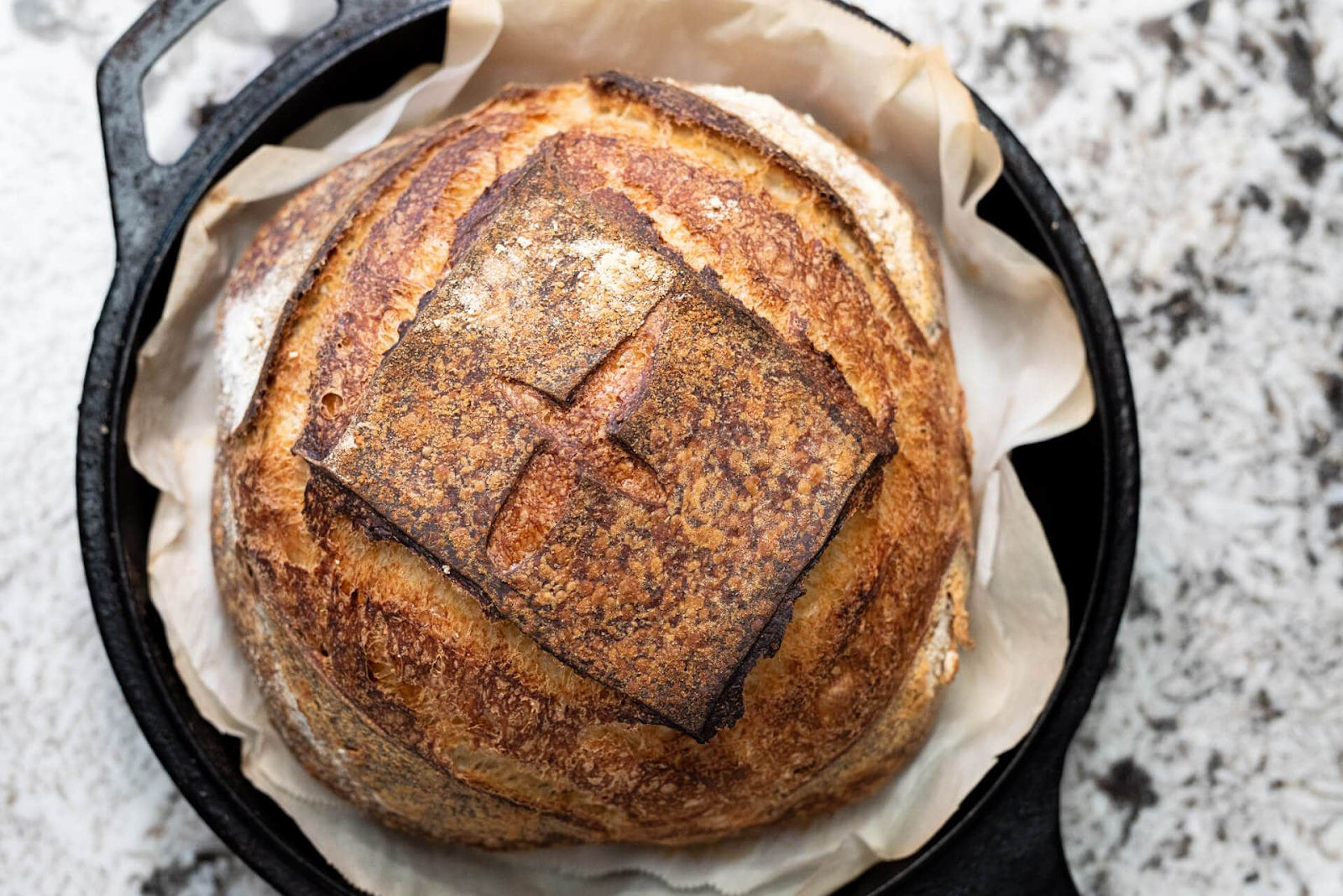 Top 10 Sourdough Starter Tips - sourdough bread in dutch oven