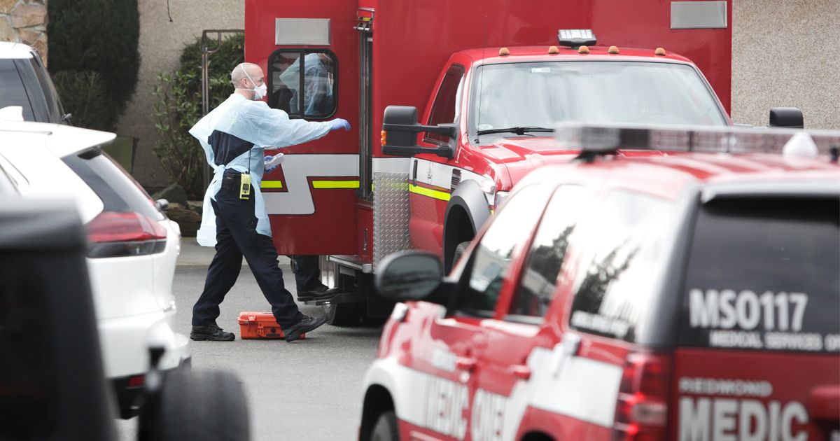 A first responder at an emergency scene, displaying signs of fatigue and distress, indicative of potential substance abuse issues.