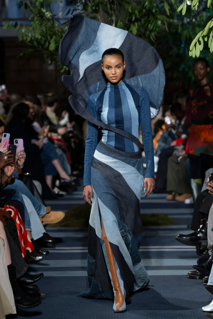 Picture showing a model in denim dress for the fashion show