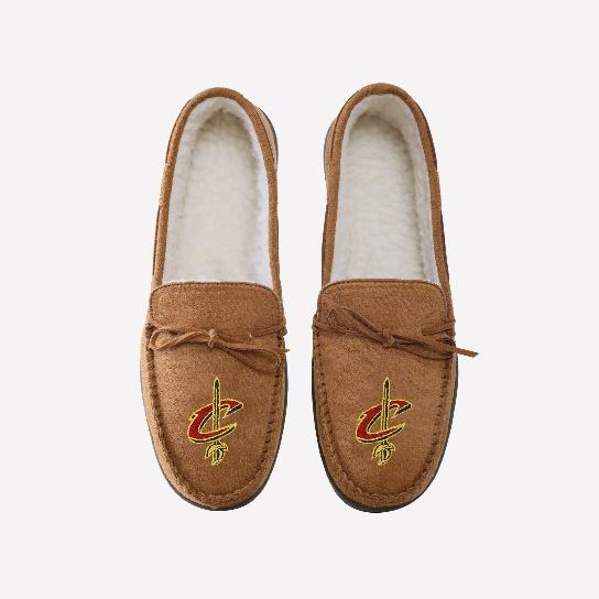 A pair of brown slippers with a logo on them

Description automatically generated
