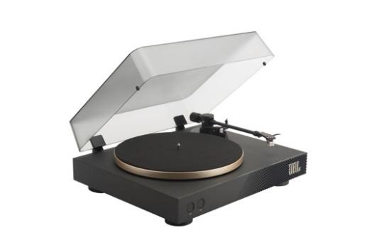 A record player with a clear cover

Description automatically generated