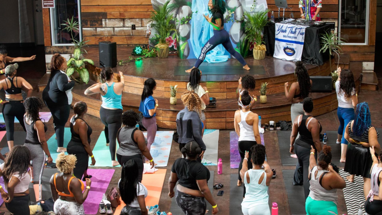 Guests at in-person yoga event