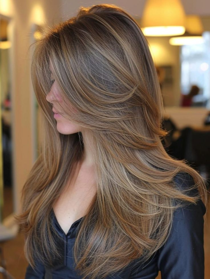 Side view of a lady wearing the gorgeous layered haircut