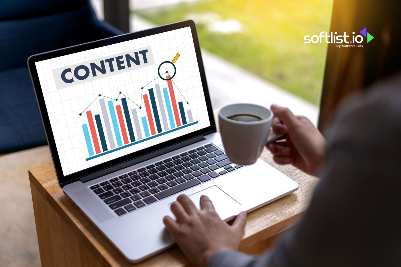 Laptop displaying content analysis chart and coffee cup