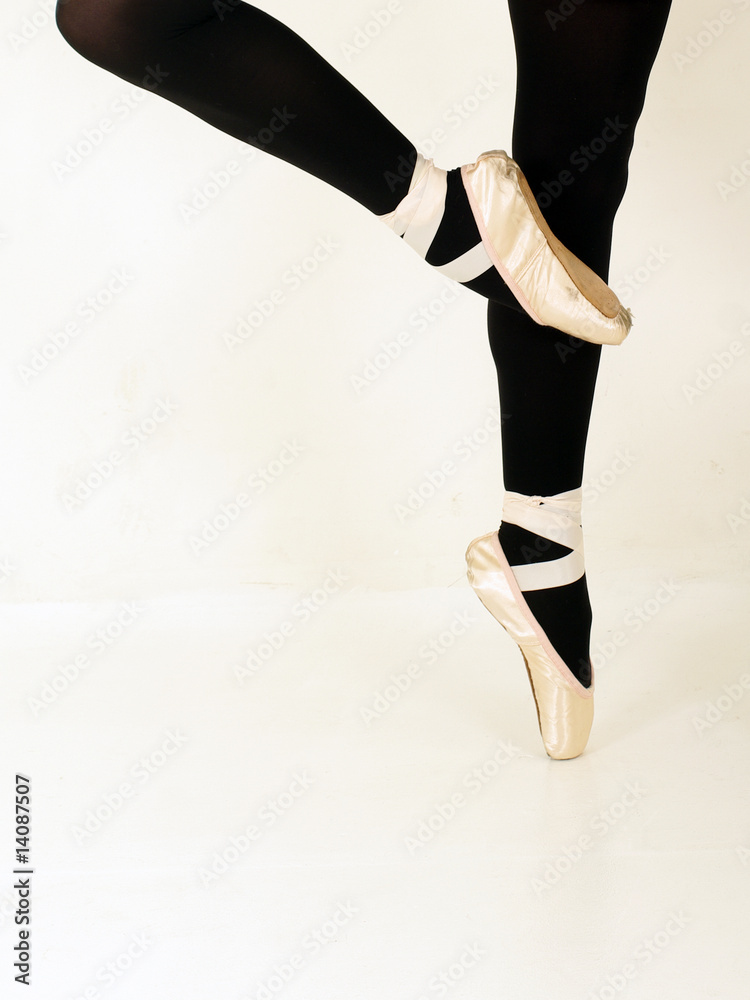 Ballerina in pink shoes and black tights Stock Photo | Adobe Stock