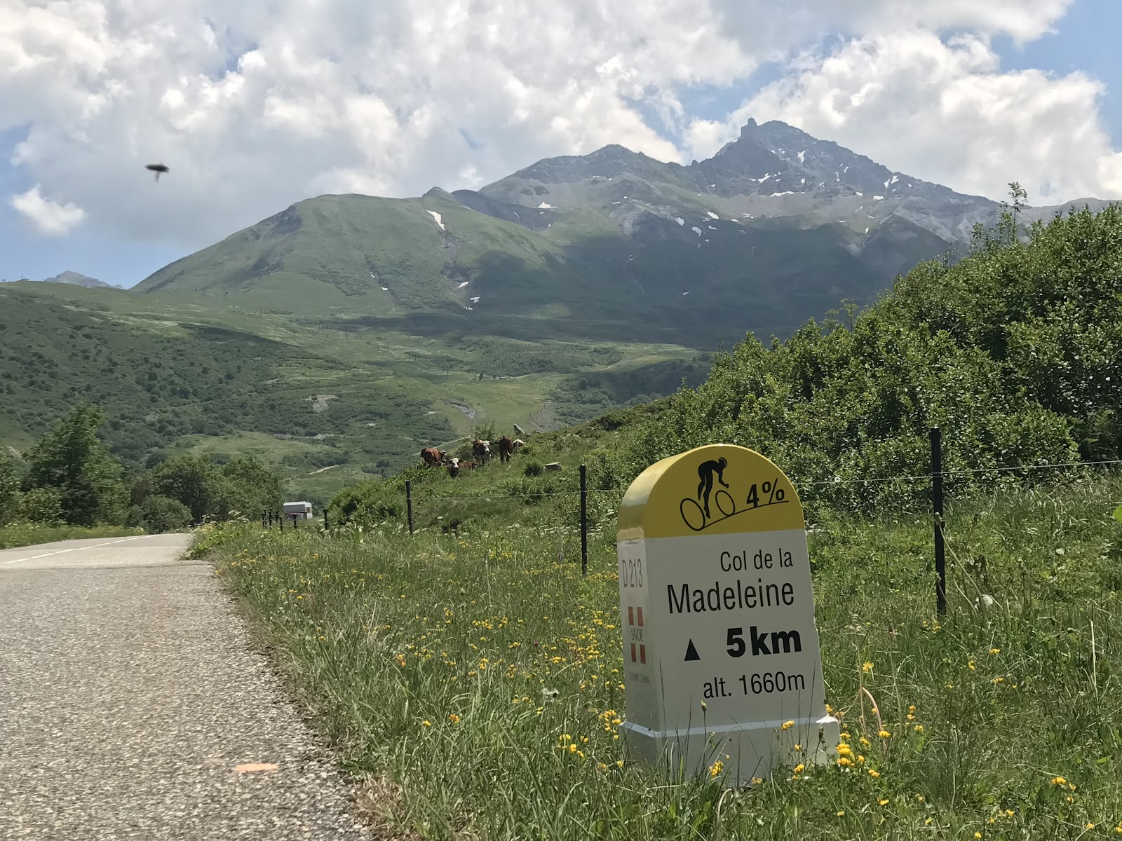 Cycling Col de Madeleine from La Léchère - km marker and roadway