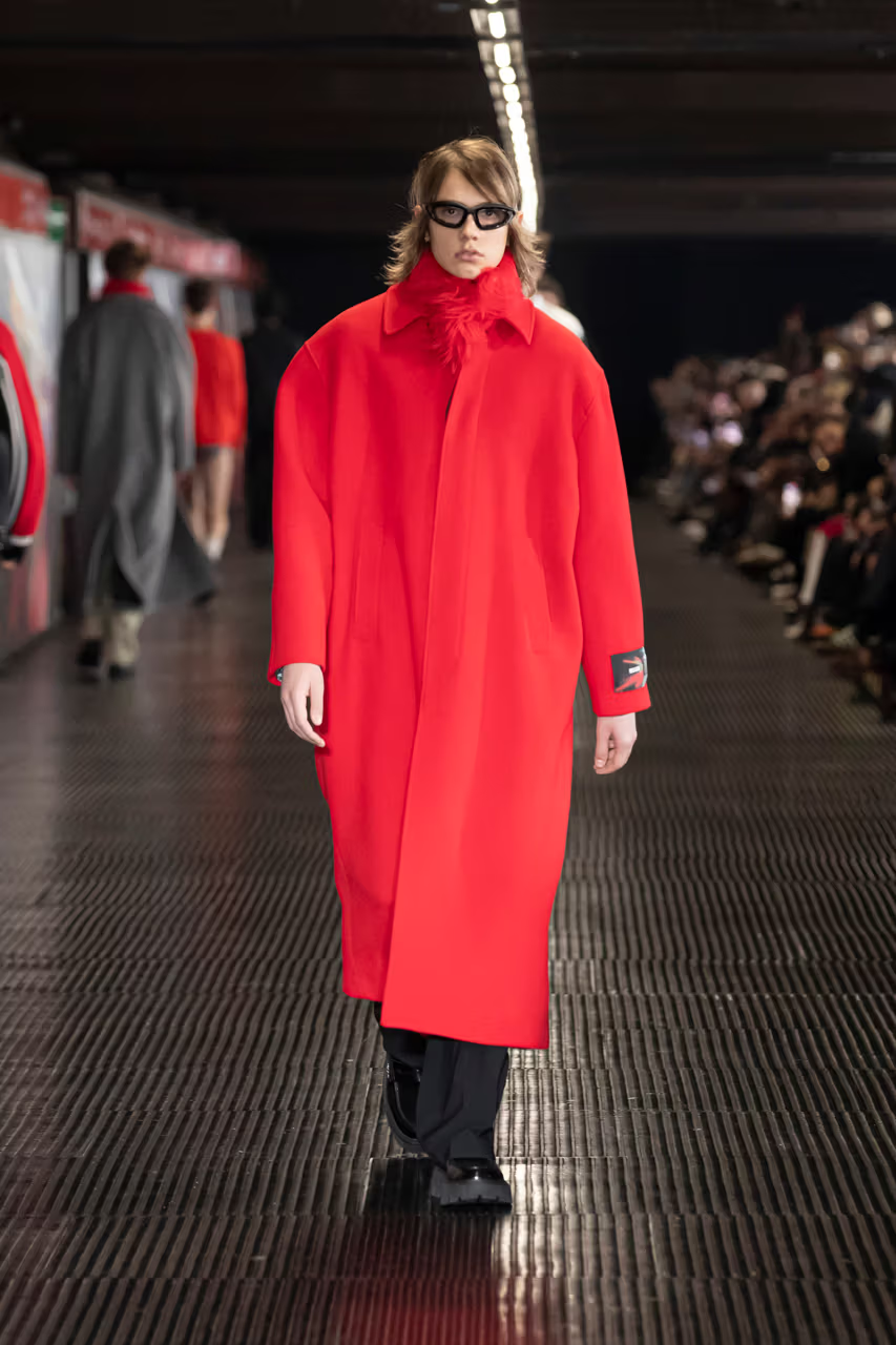 Picture of a model with a red stylish coat for MSGM