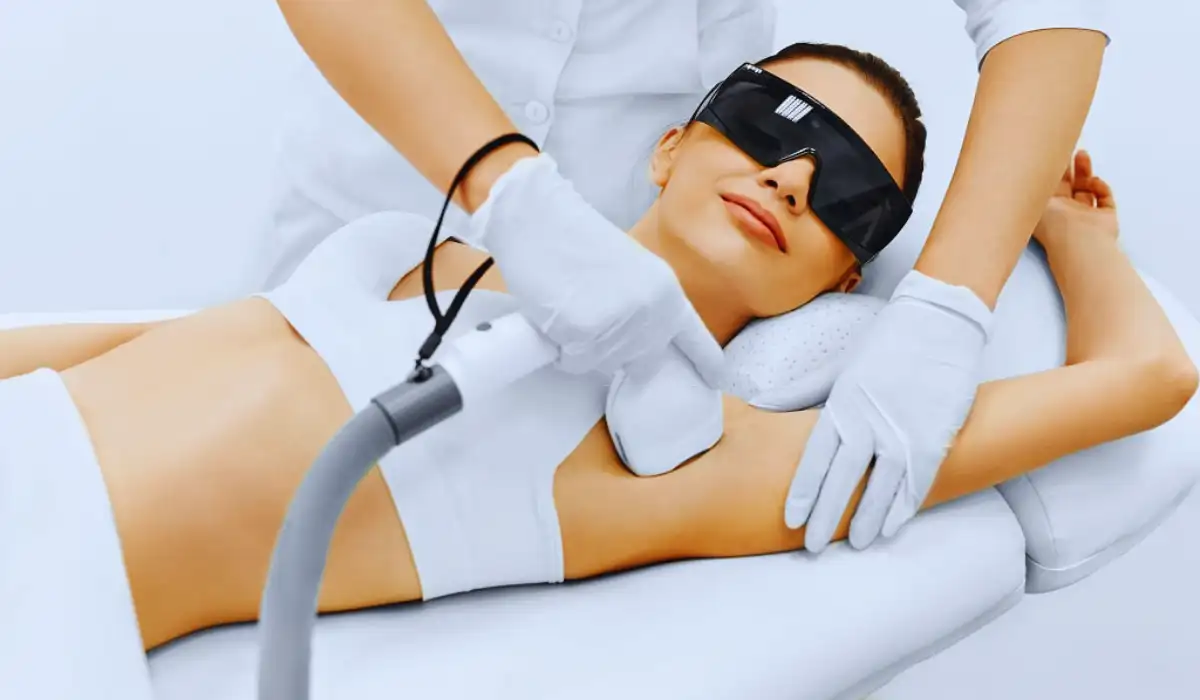 Picture showing a lady undergoing hair removal in her armpits